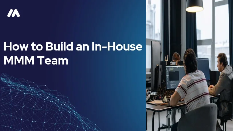 Blue banner reading 'How to Build an In-House MMM Team' beside a photo of two colleagues working at desktop computers in an office.